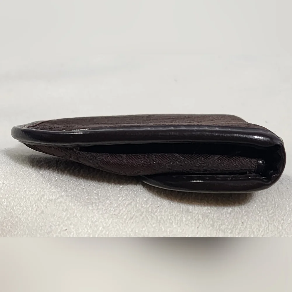 Christian Dior Trotter coin pouch.